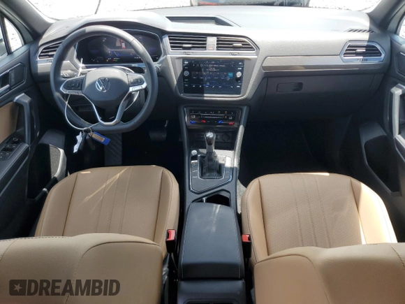 2023 Volkswagen Tiguan SE with VIN 3VV3B7AX6PM130952, listed as a Copart auction lot 56614335 with 24,996 mi miles and Salvage title. Bid and sale history available at DreamBid. Image 8.
