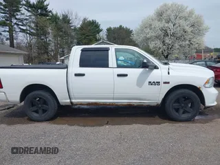 2015 Ram 1500 Express z VIN 1C6RR7KT3FS647476, wystawiony jako IAAI lot #41987391 z przebiegiem 150 000 mil mil oraz . Historia ofert i sprzedaży dostępna na DreamBid. Obrazek 14.