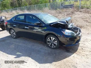 2019 Nissan Sentra S z VIN 3N1AB7AP6KY298908, wystawiony jako IAAI lot #42050263 z przebiegiem 91 764 mil mil oraz . Historia ofert i sprzedaży dostępna na DreamBid. Obrazek 1.