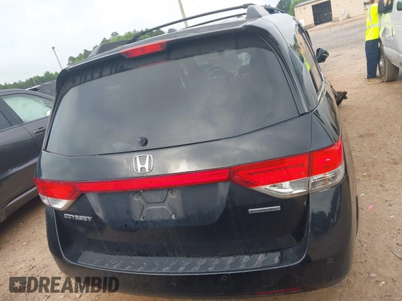 2015 Honda Odyssey Touring Elite with VIN 5FNRL5H90FB065004, listed as a IAAI auction lot 42461597 with 317,523 mi miles and . Bid and sale history available at DreamBid. Image 16.