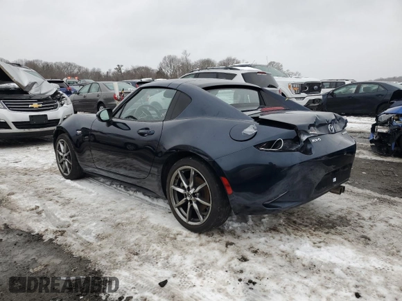 2021 Mazda MX-5 Miata Grand Touring with VIN JM1NDAM77M0454582, listed as a Copart auction lot 44959535 with 44,438 mi miles and Salvage title. Bid and sale history available at DreamBid. Image 2.