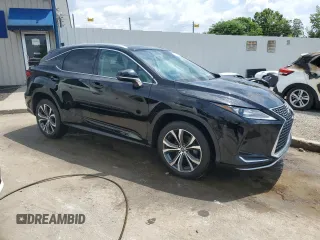 2020 Lexus RX 350 с VIN 2T2HZMDAXLC225454, выставлен на аукционе Copart как лот 61424305 с пробегом 97 348 миль миль и Списание • Salvage title. История ставок и продаж доступна на DreamBid. Изображение 4.