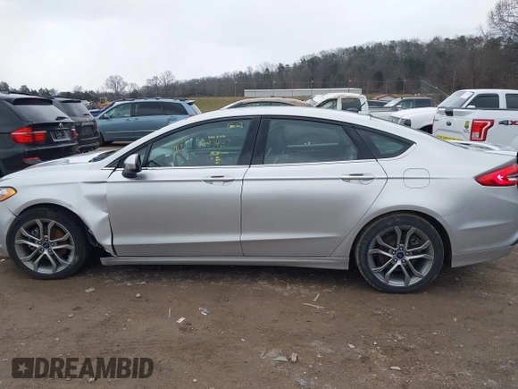2017 Ford Fusion SE z VIN 3FA6P0H78HR174956, wystawiony jako IAAI lot #41258610 z przebiegiem 70 180 mil mil oraz . Historia ofert i sprzedaży dostępna na DreamBid. Obrazek 14.
