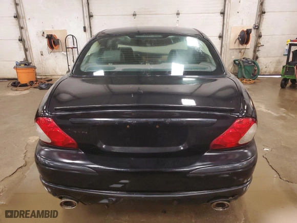 2005 Jaguar X-Type 3.0L with VIN SAJWA51C05WE41522, listed as a Copart auction lot 62837564 with 91,885 mi miles and Clean Title. Bid and sale history available at carsss.com. Image 6.