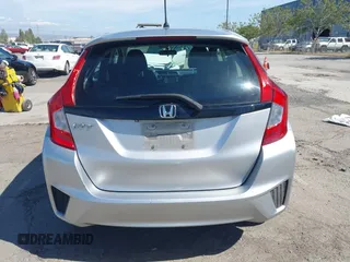 2015 Honda Fit LX z VIN 3HGGK5H51FM750102, wystawiony jako IAAI lot #42278830 z przebiegiem 121 855 mil mil oraz . Historia ofert i sprzedaży dostępna na DreamBid. Obrazek 16.