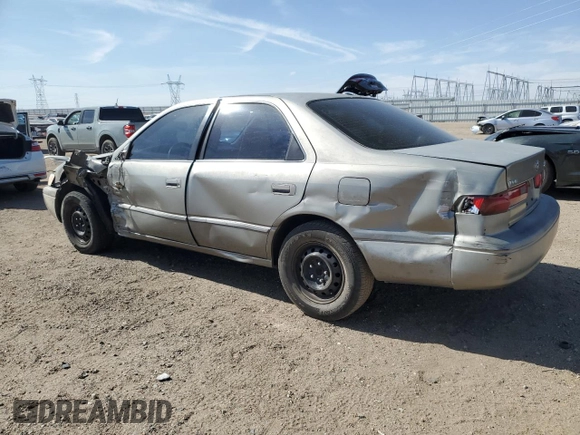 1999 Toyota Camry LE с VIN JT2BG22KXX0284593, выставлен на аукционе Copart как лот 54061685 с пробегом 229 047 миль миль и Списание • Salvage title. История ставок и продаж доступна на DreamBid. Изображение 2.