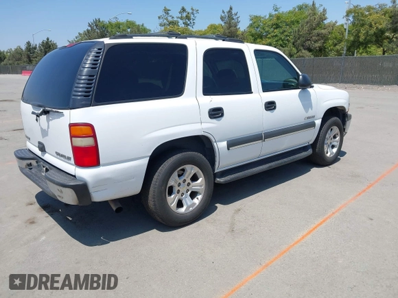 2003 Chevrolet Tahoe LS with VIN 1GNEC13V73R265144, listed as a IAAI auction lot 42464386 with 238,249 mi miles and . Bid and sale history available at DreamBid. Image 4.