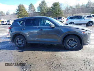 2017 Mazda CX-5 Touring with VIN JM3KFBCL3H0214881, listed as a IAAI auction lot 41694560 with 64,609 mi miles. Bid and sale history available at carsss.com. Image 13.