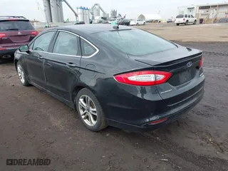 2015 Ford Fusion Titanium Hybrid with VIN 3FA6P0RU6FR299374, listed as a IAAI auction lot 41576007 with 191,285 mi miles. Bid and sale history available at carsss.com. Image 3.