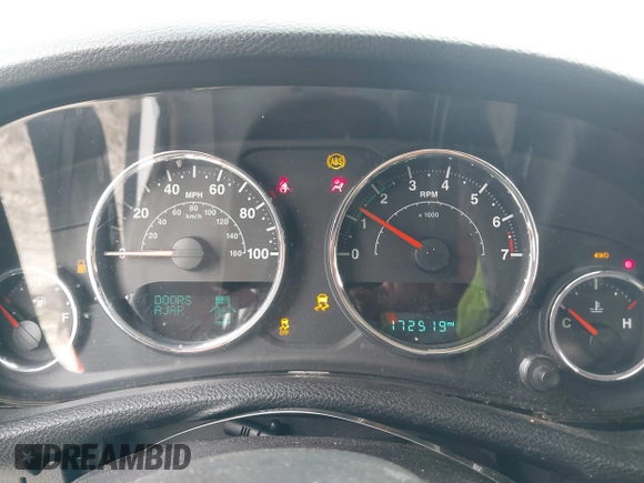 2015 Jeep Wrangler Sport with VIN 1C4AJWAG5FL757161, listed as a IAAI auction lot 41932705 with 172,519 mi miles and . Bid and sale history available at DreamBid. Image 7.
