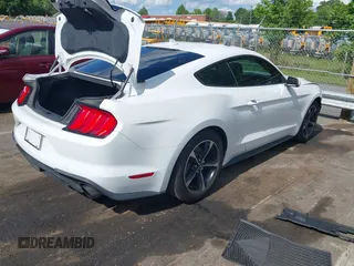 2020 Ford Mustang EcoBoost with VIN 1FA6P8TH4L5190405, listed as a IAAI auction lot 42221673 with 54,854 mi miles and . Bid and sale history available at DreamBid. Image 4.