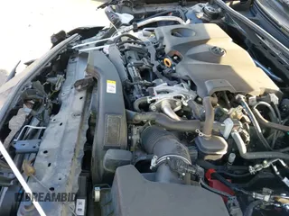 2019 Toyota Camry SE z VIN 4T1B11HK1KU704880, wystawiony jako IAAI lot #43241503 z przebiegiem 96 395 mil mil oraz . Historia ofert i sprzedaży dostępna na DreamBid. Obrazek 20.