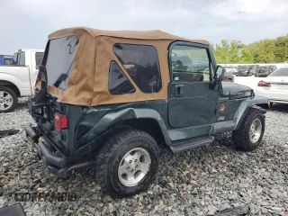 2002 Jeep Wrangler Sahara with VIN 1J4FA59S52P763290, listed as a Copart auction lot 59115665 with 129,479 mi miles and Non repairable. Bid and sale history available at DreamBid. Image 3.