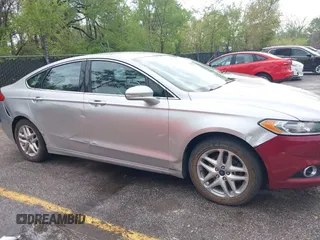 2013 Ford Fusion SE z VIN 3FA6P0HR3DR148664, wystawiony jako IAAI lot #42057963 z przebiegiem 239 120 mil mil oraz . Historia ofert i sprzedaży dostępna na DreamBid. Obrazek 6.