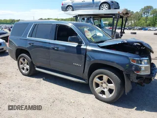 2020 Chevrolet Tahoe LT with VIN 1GNSKBKC6LR239081, listed as a IAAI auction lot 42298842 with 125,328 mi miles and . Bid and sale history available at DreamBid. Image 1.