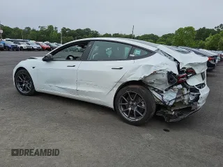 2023 Tesla Model 3 with VIN 5YJ3E1EA0PF463239, listed as a Copart auction lot 59770525 with 48,086 mi miles and Clean title. Bid and sale history available at DreamBid. Image 2.