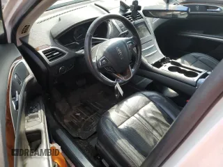 2014 Lincoln MKZ Hybrid с VIN 3LN6L2LU3ER833502, выставлен на аукционе Copart как лот 55996595 с пробегом Не указан миль и Списание • Salvage title. История ставок и продаж доступна на DreamBid. Изображение 8.
