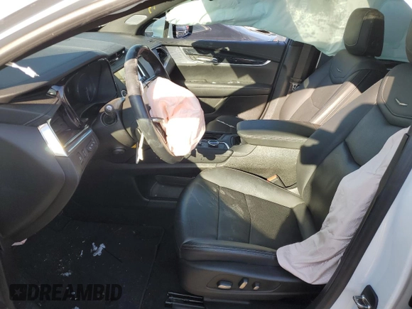 2023 Cadillac XT5 AWD Premium Luxury with VIN 1GYKNDR4XPZ144579, listed as a Copart auction lot 84295934 with Not Provided miles and Salvage Title. Bid and sale history available at DreamBid. Image 7.