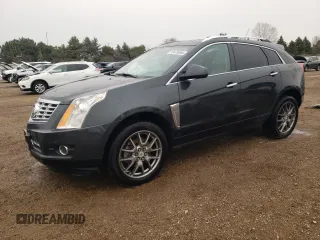 2014 Cadillac SRX Performance Collection with VIN 3GYFNCE36ES661204, listed as a Copart auction lot 53478095 with 66,613 mi miles and Salvage title. Bid and sale history available at DreamBid. Image 1.
