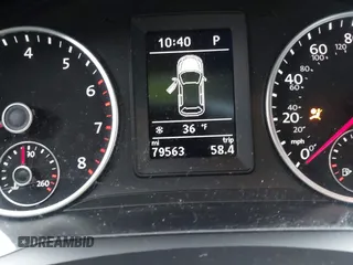 2016 Volkswagen Tiguan R-Line with VIN WVGBV7AX8GW592927, listed as a IAAI auction lot 41521533 with 79,563 mi miles and . Bid and sale history available at DreamBid. Image 15.