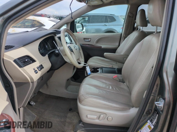 2013 Toyota Sienna XLE with VIN 5TDDK3DC1DS063127, listed as a Copart auction lot 58387015 with 196,574 mi miles and Salvage title. Bid and sale history available at DreamBid. Image 7.