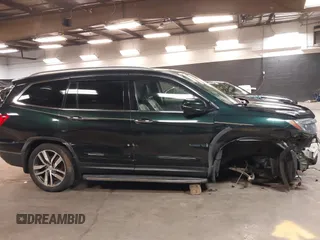 2016 Honda Pilot Touring with VIN 5FNYF6H98GB035226, listed as a IAAI auction lot 42022957 with 103,842 mi miles and . Bid and sale history available at DreamBid. Image 14.
