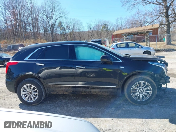 2018 Cadillac XT5 FWD with VIN 1GYKNARS5JZ235585, listed as a IAAI auction lot 41607440 with 77,220 mi miles and . Bid and sale history available at DreamBid. Image 13.