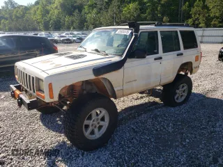 2000 Jeep Cherokee with VIN 1J4FF48S0YL231653, listed as a Copart auction lot 58429855 with 222,866 mi miles and Salvage title. Bid and sale history available at DreamBid. Image 1.