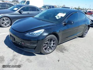 2019 Tesla Model 3 Mid Range with VIN 5YJ3E1EA5KF306816, listed as a IAAI auction lot 41710916 with 76,222 mi miles. Bid and sale history available at carsss.com. Image 2.