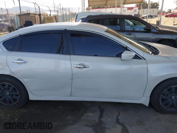 2015 Nissan Altima 2.5 S with VIN 1N4AL3AP6FC228428, listed as a IAAI auction lot 41966303 with 118,706 mi miles. Bid and sale history available at carsss.com. Image 13.
