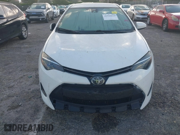 2019 Toyota Corolla L with VIN 2T1BURHE0KC179280, listed as a IAAI auction lot 41944624 with 102,964 mi miles. Bid and sale history available at carsss.com. Image 6.