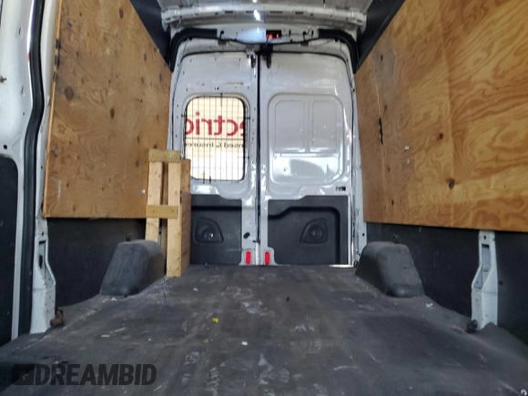 2015 Ford Transit Cargo с VIN 1FTNR2XG9FKA25521, выставлен на аукционе Copart как лот 63372545 с пробегом 145 538 миль миль и Списание • Salvage title. История ставок и продаж доступна на DreamBid. Изображение 10.