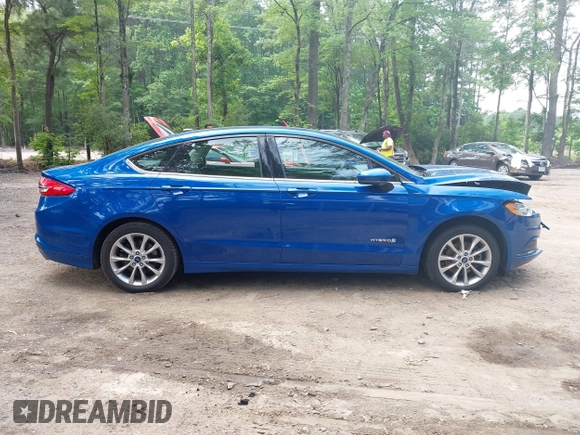 2017 Ford Fusion Hybrid SE with VIN 3FA6P0LU1HR162662, listed as a IAAI auction lot 42465793 with 116,414 mi miles and . Bid and sale history available at DreamBid. Image 13.
