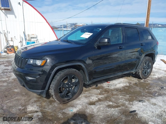 2019 Jeep Grand Cherokee Laredo E with VIN 1C4RJFAG9KC545246, listed as a IAAI auction lot 41478586 with 146,025 mi miles. Bid and sale history available at carsss.com. Image 2.
