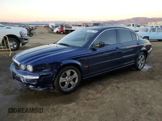 2002 Jaguar X-Type with VIN SAJEA51CX2WC23708, listed as a Copart auction lot 88547715 with 36,319 mi miles and Clean Title. Bid and sale history available at carsss.com. Image 1.
