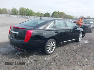2013 Cadillac XTS Luxury with VIN 2G61P5S37D9100633, listed as a IAAI auction lot 41902525 with 177,071 mi miles. Bid and sale history available at carsss.com. Image 4.