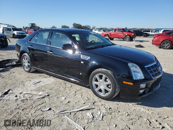 2009 Cadillac STS AWD z VIN 1G6DD67V690120833, wystawiony jako Copart lot #42502345 z przebiegiem 100 250 mil mil oraz Szkoda całkowita • Salvage title. Historia ofert i sprzedaży dostępna na DreamBid. Obrazek 4.