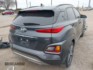 2019 Hyundai Kona Limited with VIN KM8K33A51KU355200, listed as a IAAI auction lot 41577081 with 14,718 mi miles. Bid and sale history available at carsss.com. Image 4.