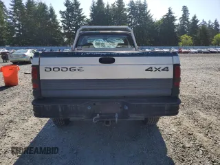 1999 Dodge 2500 z VIN 1B7KF2360XJ585301, wystawiony jako Copart lot #58319385 z przebiegiem 318 952 mil mil oraz Szkoda całkowita • Salvage title. Historia ofert i sprzedaży dostępna na DreamBid. Obrazek 6.