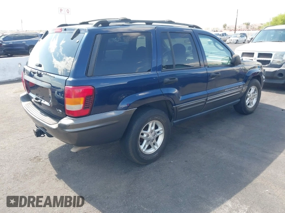 2004 Jeep Grand Cherokee with VIN 1J4GX48J74C283123, listed as a IAAI auction lot 42477393 with 182,491 mi miles and . Bid and sale history available at DreamBid. Image 4.