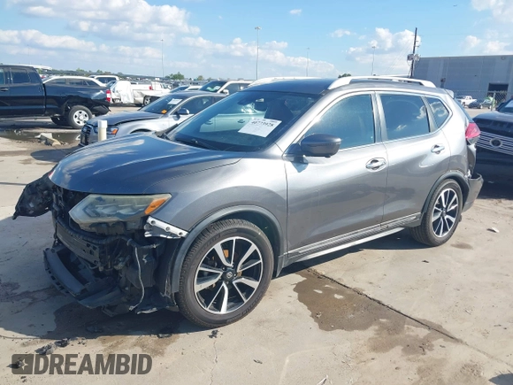 2017 Nissan Rogue SL with VIN 5N1AT2MT2HC859544, listed as a IAAI auction lot 40773928 with 200,265 mi miles and . Bid and sale history available at DreamBid. Image 19.