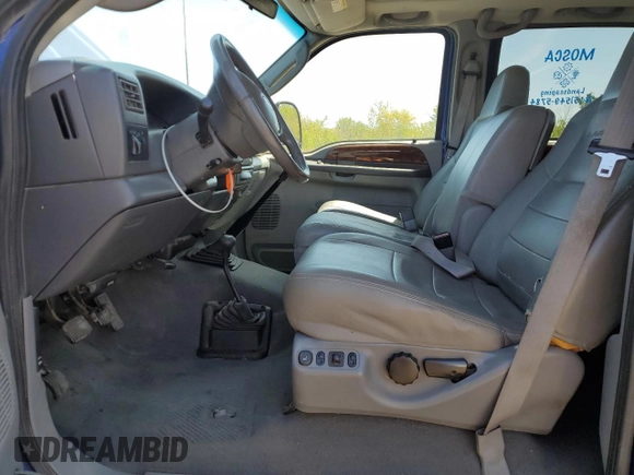 2003 Ford F-350 XL with VIN 1FTWW33P53EB90677, listed as a Copart auction lot 56300685 with 174,091 mi miles and Salvage title. Bid and sale history available at DreamBid. Image 7.