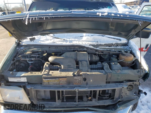 2000 Ford Econoline Cargo with VIN 1FDRE14W9YHA92344, listed as a Copart auction lot 83749374 with 164,823 mi miles and Salvage Title. Bid and sale history available at DreamBid. Image 12.