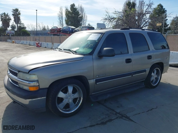 2001 Chevrolet Tahoe LS with VIN 1GNEK13T51J203013, listed as a IAAI auction lot 41886371 with 218,779 mi miles. Bid and sale history available at carsss.com. Image 2.