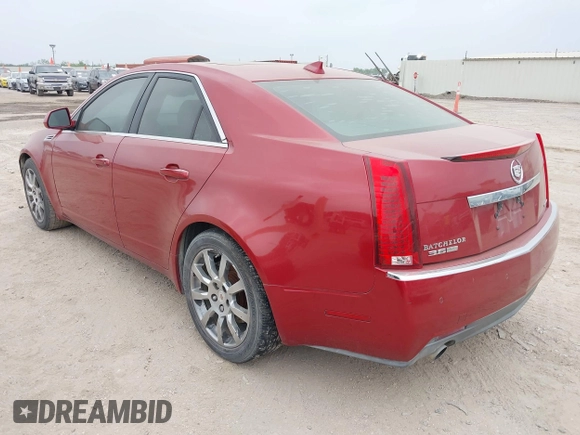 2009 Cadillac CTS RWD w/1SB with VIN 1G6DV57V390133952, listed as a IAAI auction lot 41948486 with 216,593 mi miles. Bid and sale history available at carsss.com. Image 3.