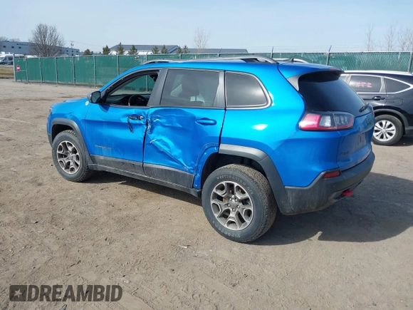 2021 Jeep Cherokee Trailhawk with VIN 1C4PJMBX4MD222987, listed as a IAAI auction lot 41771808 with 52,533 mi miles and . Bid and sale history available at DreamBid. Image 3.