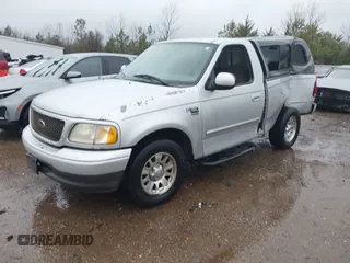 2003 Ford F-150 XL with VIN 1FTRF17W73NA72178, listed as a IAAI auction lot 41728356 with 207,708 mi miles and . Bid and sale history available at DreamBid. Image 2.