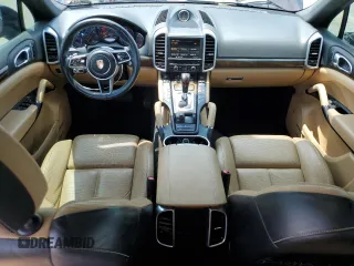 2016 Porsche Cayenne with VIN WP1AA2A24GKA14980, listed as a Copart auction lot 63139115 with 84,671 mi miles and Salvage title. Bid and sale history available at DreamBid. Image 8.