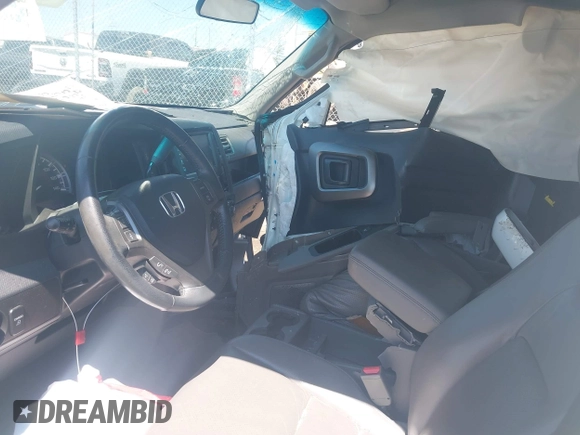 2009 Honda Ridgeline RTL with VIN 5FPYK16529B107871, listed as a IAAI auction lot 42049833 with 141,214 mi miles. Bid and sale history available at carsss.com. Image 5.