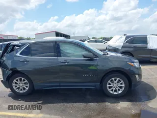 2020 Chevrolet Equinox LT z VIN 3GNAXKEVXLS509839, wystawiony jako IAAI lot #41936493 z przebiegiem 141 814 mil mil oraz . Historia ofert i sprzedaży dostępna na DreamBid. Obrazek 13.